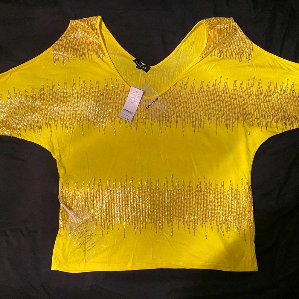 Bebe V-neck cold shoulder sequin top